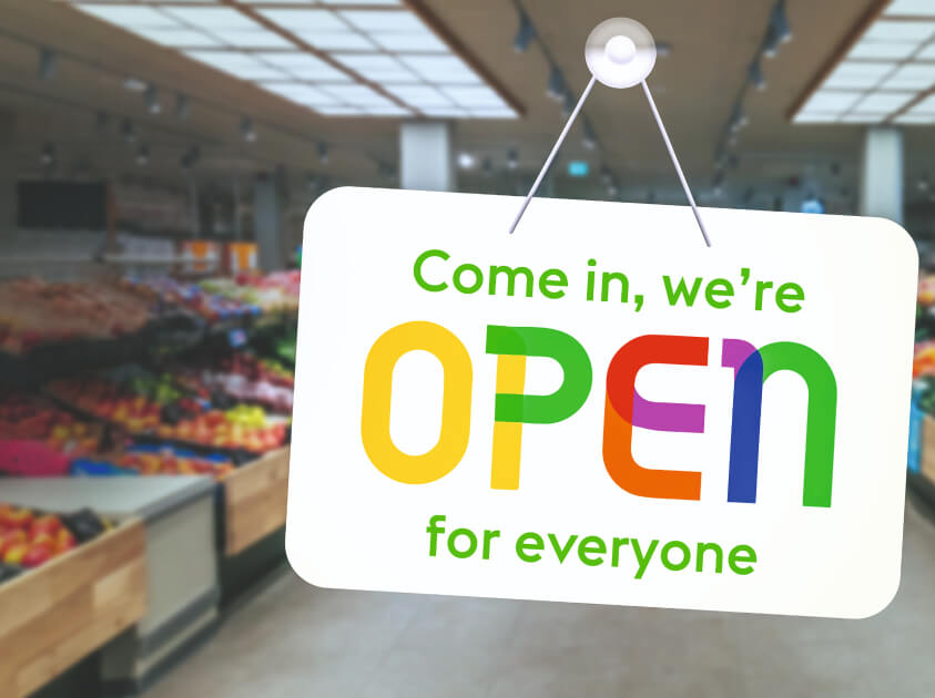 a photo of an open sign in a shop window